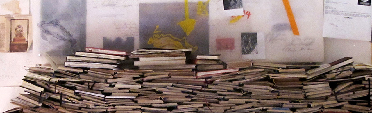 Pile of books full of drawings